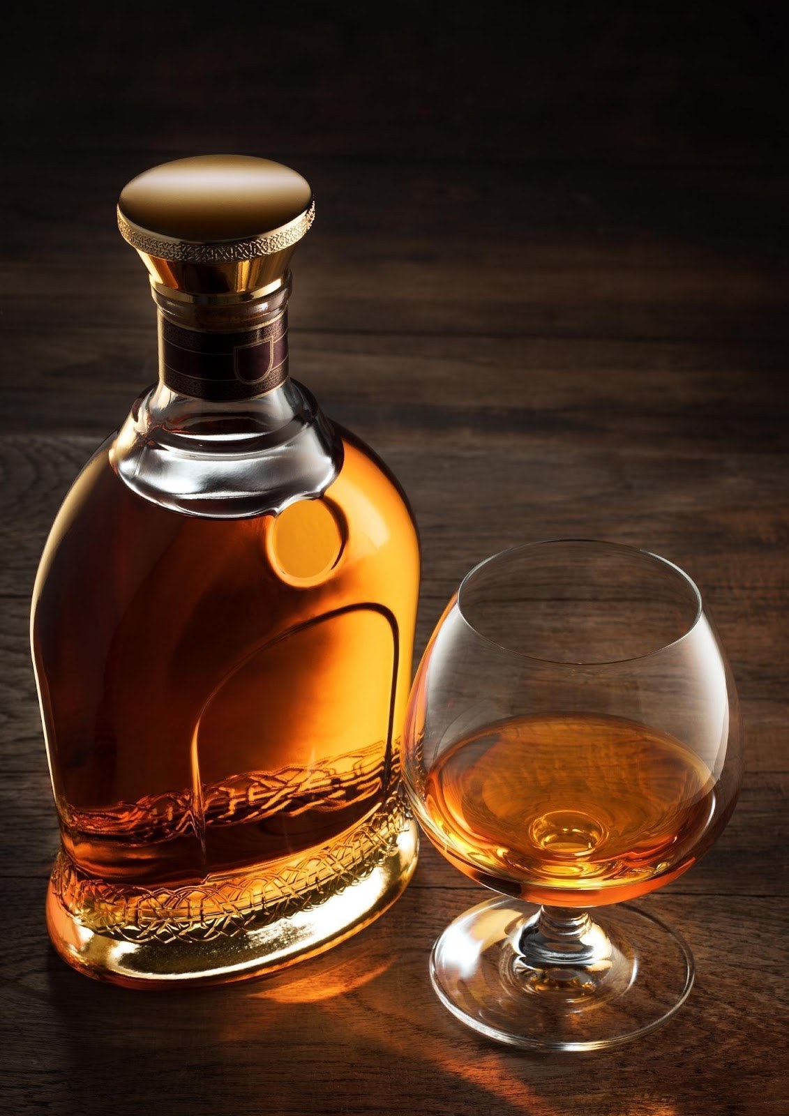 A snifter of cognac in warm light